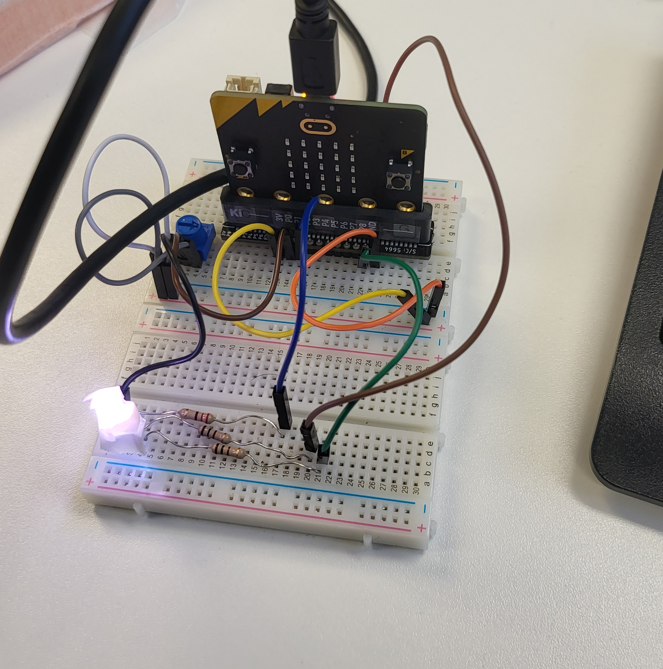 Photo of smooth breathing LED plugged into breadboard with nrf52 on micro:bit devboard